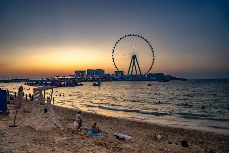 JBR beach at sunset with Ain Dubai behind. Photo: Selim Karadayi, Pexels